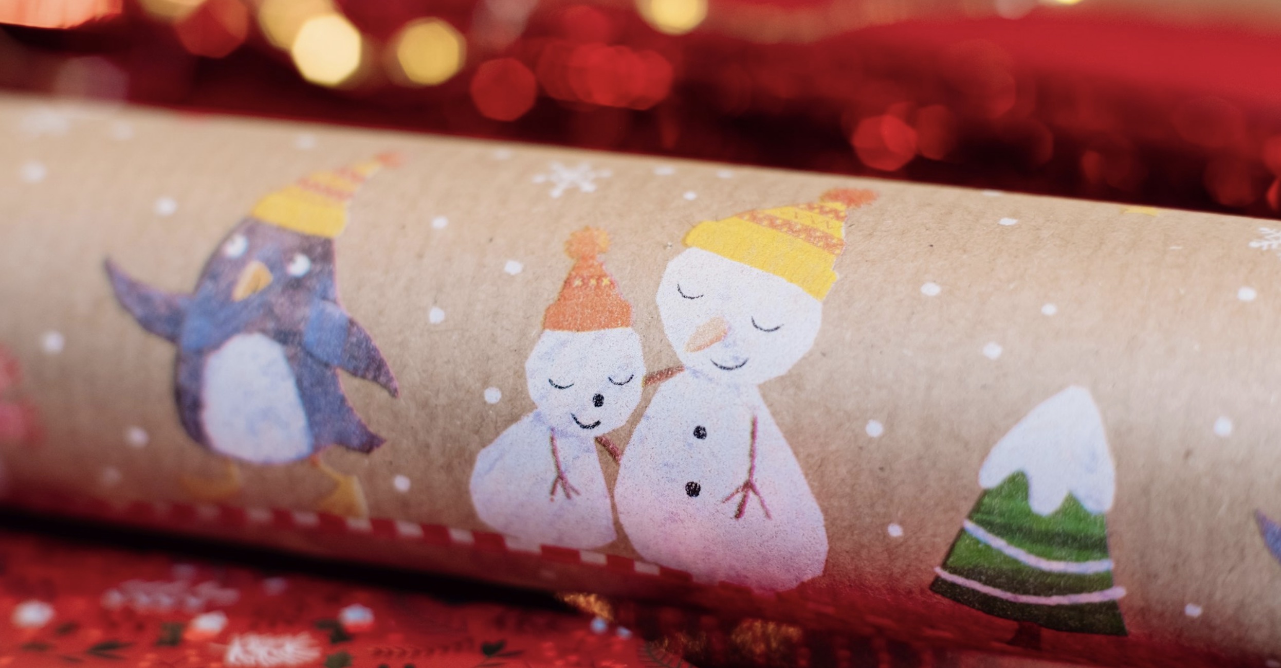 A roll of Christmas wrapping paper.