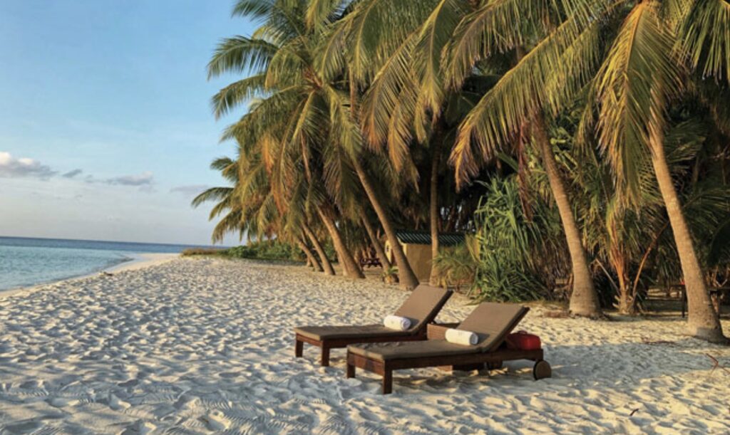 Two chairs on a beach