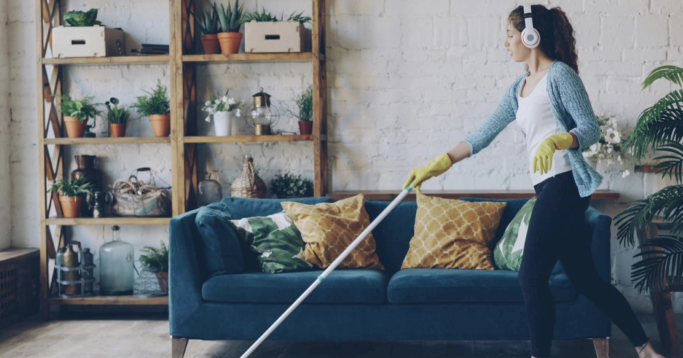 a young woman cleaning the floor